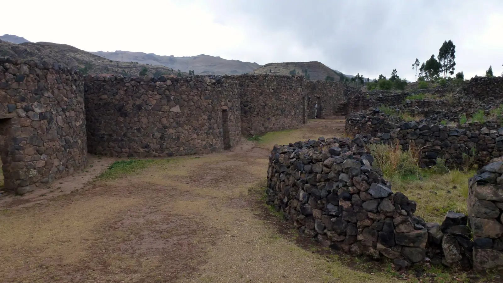 Round Inca storehouses, or colcas, at the Raqchi archaeological site
